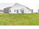 Expansive backyard featuring a grill and lush green lawn, providing ample space for outdoor enjoyment at 238 Switchgrass Ln, New Whiteland, IN 46184