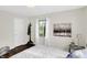 Cozy bedroom with hard wood floors, neutral walls, and a decorative painting at 2404 Wildwood Ave, Anderson, IN 46011