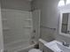Bathroom with a tub and shower combo and white fixtures at 2465 N Eaton Ave, Indianapolis, IN 46219
