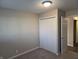 Comfortable bedroom offering closet space and access to a hallway at 2465 N Eaton Ave, Indianapolis, IN 46219