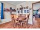 Traditional dining room with a wooden table and hardwood flooring at 257 N Letterman Rd, Paragon, IN 46166