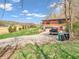 Two-story brick house with an attached garage, driveway, and some landscaping at 257 N Letterman Rd, Paragon, IN 46166