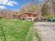Traditional brick home with a covered porch, a built-in garage, and a nice yard at 257 N Letterman Rd, Paragon, IN 46166