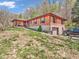 Two story brick home with an attached garage and a covered porch at 257 N Letterman Rd, Paragon, IN 46166