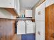 Functional laundry room equipped with a washer, dryer, and storage cabinets, providing convenience and organization at 257 N Letterman Rd, Paragon, IN 46166