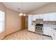 Charming kitchen featuring modern appliances, granite counters, and ample cabinet space at 2680 Woodfield Blvd, Franklin, IN 46131