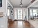 Spacious foyer featuring hardwood flooring and an elegant entranceway, creating a welcoming atmosphere at 3128 E Fall Creek Pkwy N Dr, Indianapolis, IN 46205