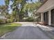 Charming home with well-maintained front yard, long driveway and landscaped garden at 3128 E Fall Creek Pkwy N Dr, Indianapolis, IN 46205