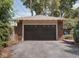 A detached two-car garage offers parking and storage space at 3128 E Fall Creek Pkwy N Dr, Indianapolis, IN 46205