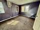 Cozy bedroom featuring carpet flooring and windows that provide natural light at 3136 Foltz St, Indianapolis, IN 46221