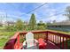 Cozy backyard deck with colorful chairs, perfect for relaxing or entertaining at 319 E Ohio St, Fortville, IN 46040