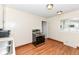 Kitchen area featuring a stainless steel range, sink, and wood-look flooring at 319 E Ohio St, Fortville, IN 46040