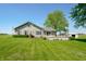 Inviting home with a spacious lawn and peaceful surroundings at 403 N Red Gold Dr, Trafalgar, IN 46181
