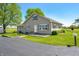 Lovely home with a well-manicured lawn and charming curb appeal at 403 N Red Gold Dr, Trafalgar, IN 46181