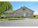 Charming exterior elevation showcasing landscaped yard, decorative shutters, and an inviting entrance at 403 N Red Gold Dr, Trafalgar, IN 46181