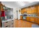 Bright kitchen with wood cabinets, stainless steel appliances, and unique decorative touches at 403 N Red Gold Dr, Trafalgar, IN 46181