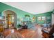 Cozy living room with hardwood floors and comfortable seating at 403 N Red Gold Dr, Trafalgar, IN 46181