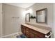 Bathroom with a double vanity and framed mirrors at 424 Orchard Blvd, Danville, IN 46122
