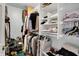 Walk-in closet with shelving, hanging rods, and ample storage space at 424 Orchard Blvd, Danville, IN 46122