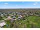 Picturesque aerial view of the community, showcasing the charming homes surrounded by lush greenery and well-maintained landscapes at 4464 Four Seasons Cir, Indianapolis, IN 46226