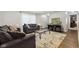 Inviting living room boasts neutral walls, modern furniture, and stylish decor at 4464 Four Seasons Cir, Indianapolis, IN 46226