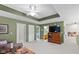 Spacious living room with neutral tones and seamless access to the ensuite bathroom at 4541 Greenthread Ct, Zionsville, IN 46077