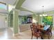 Open floor plan showing living and dining areas with abundant natural light at 4541 Greenthread Ct, Zionsville, IN 46077