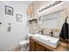 Chic bathroom featuring modern vanity with stylish fixtures and decorative accents at 4622 W 400 S, Trafalgar, IN 46181