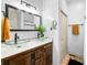 This bathroom boasts dual vessel sinks, a sleek mirror, and modern fixtures at 4622 W 400 S, Trafalgar, IN 46181