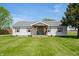 Charming single-story home with a well-manicured lawn and inviting front porch at 4622 W 400 S, Trafalgar, IN 46181