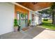 Inviting front porch with decorative door, offering a warm welcome to this charming home at 4622 W 400 S, Trafalgar, IN 46181
