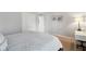 Bedroom features neutral walls, carpet, and a bed with leaf patterned duvet at 4708 Dorkin Ct, Indianapolis, IN 46254