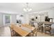 Bright dining area with a wooden table set and open view to the kitchen, perfect for entertaining at 4708 Dorkin Ct, Indianapolis, IN 46254