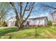 Charming single-story home with a well-maintained lawn and mature tree at 4708 Dorkin Ct, Indianapolis, IN 46254