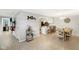 Open concept living space with kitchen bar, dining area, and stylish decor accents at 4708 Dorkin Ct, Indianapolis, IN 46254