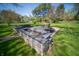 The spacious backyard features a patio area, perfect for outdoor enjoyment and relaxation at 4710 E 56Th St, Indianapolis, IN 46220