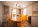 Bright dining room with a wood table, seating for four, and natural light at 4710 E 56Th St, Indianapolis, IN 46220