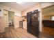 Functional kitchen with stainless steel appliances, neutral cabinets, and a tile backsplash at 4710 E 56Th St, Indianapolis, IN 46220