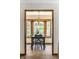 Dining room with wood trim and a large bay window overlooking the front yard at 4731 Moss Creek Ct, Indianapolis, IN 46237