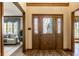 Elegant foyer featuring a beautifully crafted front door, setting a welcoming tone at 4731 Moss Creek Ct, Indianapolis, IN 46237