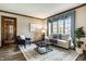 Cozy living room featuring elegant furnishings, creating a comfortable and inviting space at 4731 Moss Creek Ct, Indianapolis, IN 46237