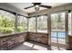 Screened porch area overlooking the backyard and pool at 4731 Moss Creek Ct, Indianapolis, IN 46237