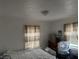 Bright bedroom with ample natural light, carpeted floors, and minimalistic decor, creating a cozy space at 518 N Grant St, Lebanon, IN 46052