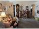 Comfortable living room featuring carpeted floors and a glimpse into other areas of the home at 518 N Grant St, Lebanon, IN 46052