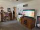Inviting living room with a television and glimpses into other rooms of the house at 518 N Grant St, Lebanon, IN 46052