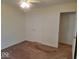 Bedroom featuring neutral walls, carpet, a ceiling fan, and a standard door at 5341 Spring Creek Ct, Indianapolis, IN 46254