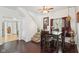Cozy dining area with hardwood floors, natural light, and space for Gathering meals at 540 S Broadway St, Atlanta, IN 46031