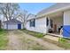 Charming home with a detached garage, blue shutters, and a welcoming front porch at 540 S Broadway St, Atlanta, IN 46031