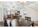 Open-concept living and dining area with hardwood floors and comfortable seating at 540 S Broadway St, Atlanta, IN 46031