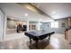 Finished basement with pool table, kitchenette, and entertainment area at 5624 Ottawa Pass, Carmel, IN 46033
